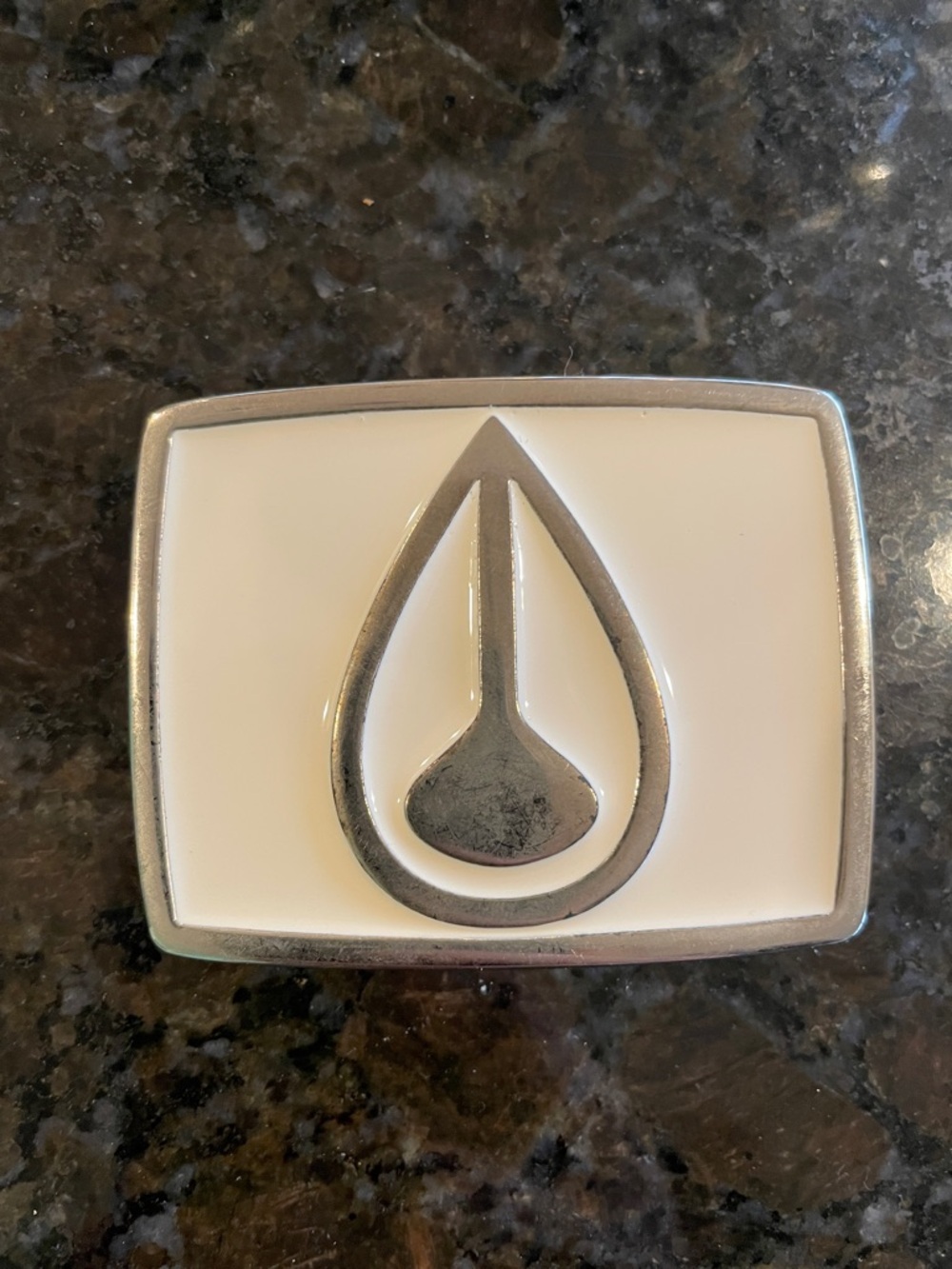 Nixon White Enamel Belt Buckle with Silver Drop Logo
